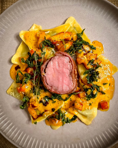 Kalbsfilet auf gefüllten Triangoli-Pasta mit Parmaschinken und Hokkaido-Kürbis